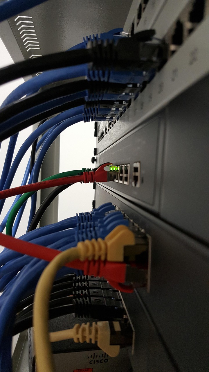 SEN electrician installing a data point in a commercial office in Melbourne